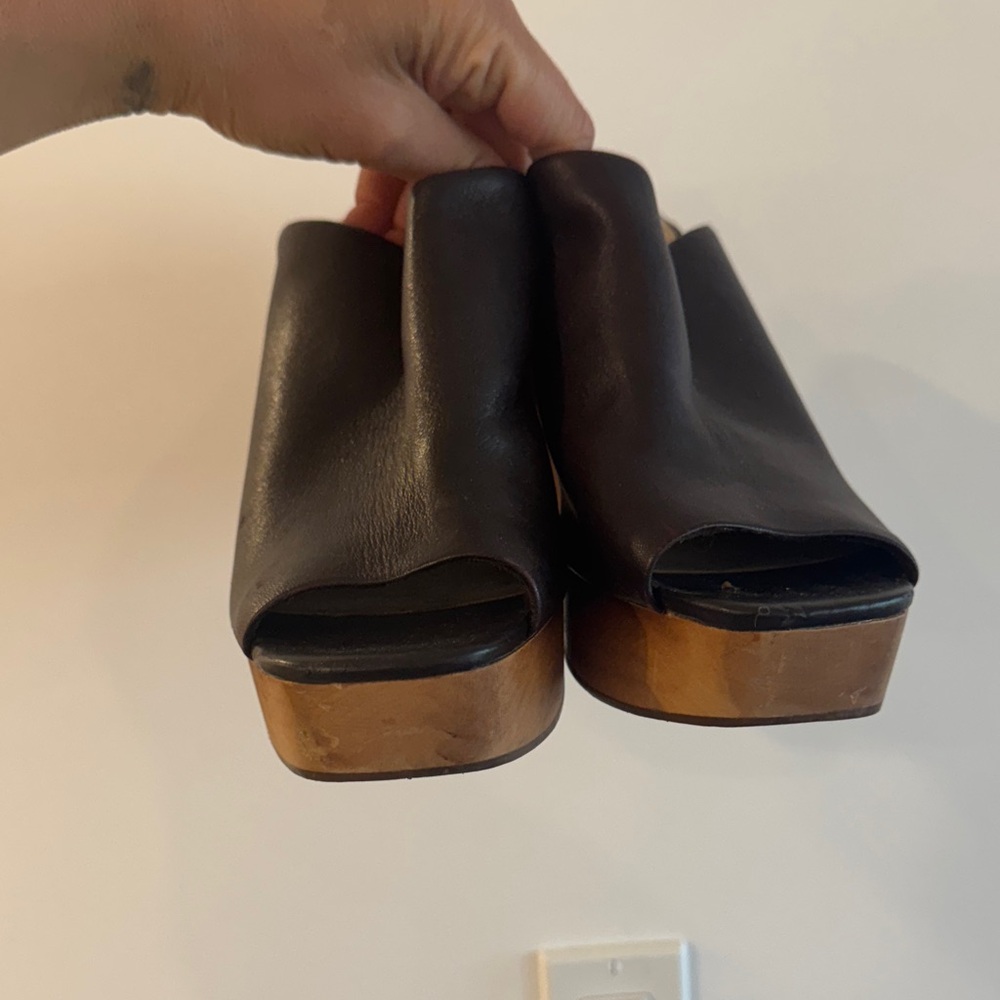 Kelsi Dagger Black Leather Platform Mules with Wood-Look Heel